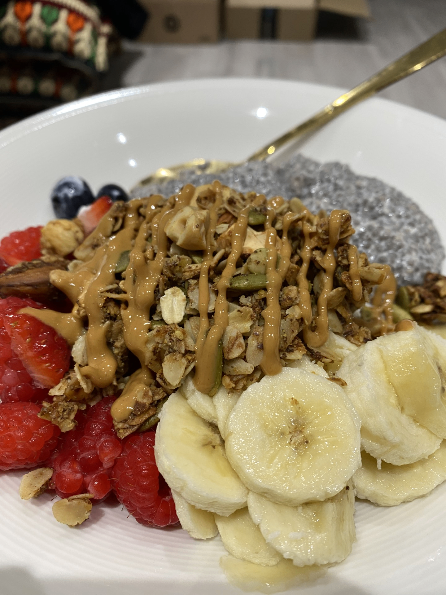 Granola with peanut butter drizzle and chia pudding